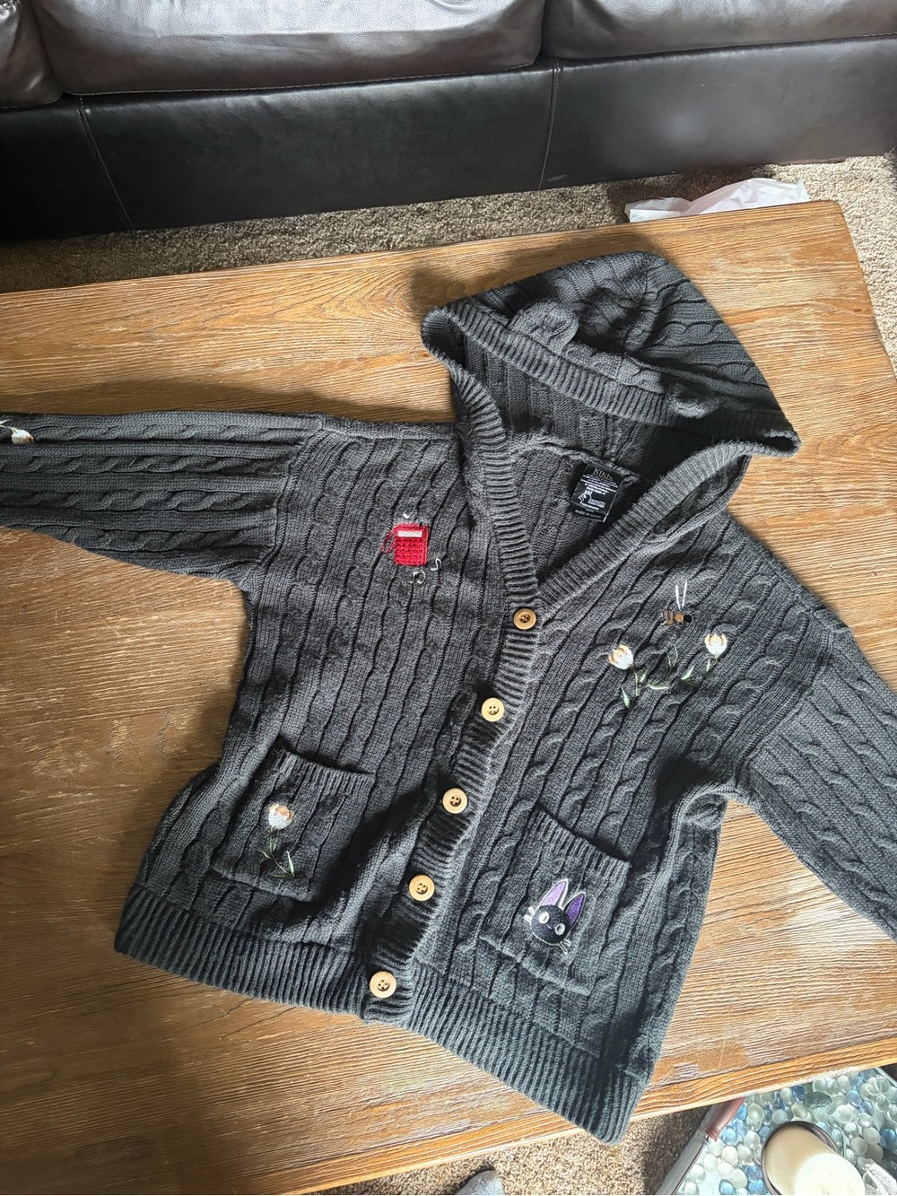 Kiki’s Charcoal Hooded Cable-Knit Cardigan with Embroidered Accents